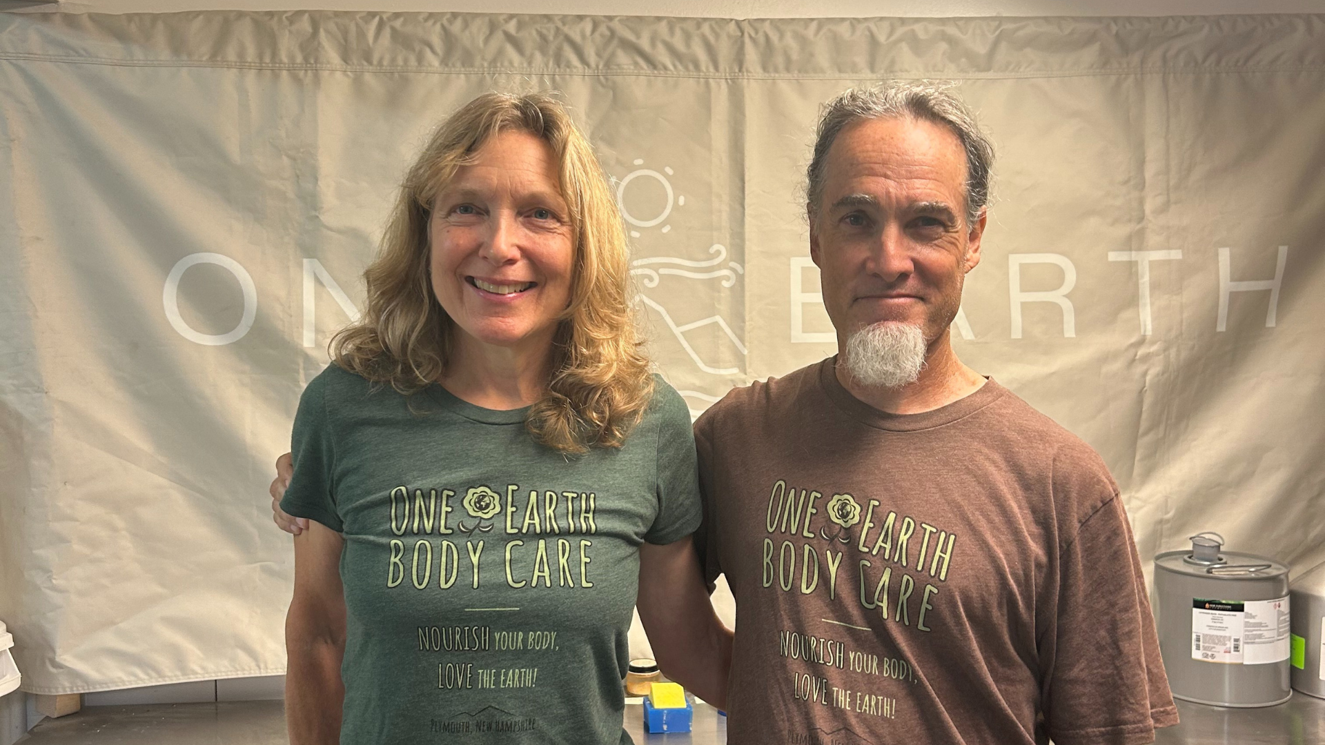 Ed and Anne wearing their One Earth Body Care t-shirts